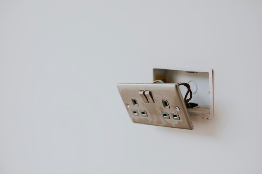 Switches and Sockets on the wall color opal white